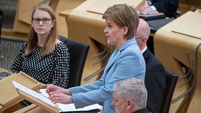 Scotland's First Minister Nicola Sturgeon delivers a statement to lawmakers in the Scottish Parliament, Edinburgh, Tuesday June 28, 2022,