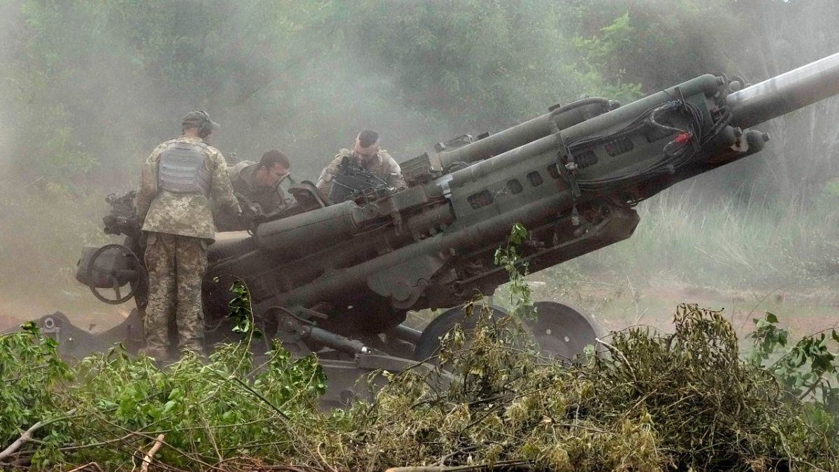 Ukrainian soldiers prepare to fire at Russian positions from a U.S.-supplied M777 howitzer in Ukraine's eastern Donetsk region Saturday, June 18, 2022. 