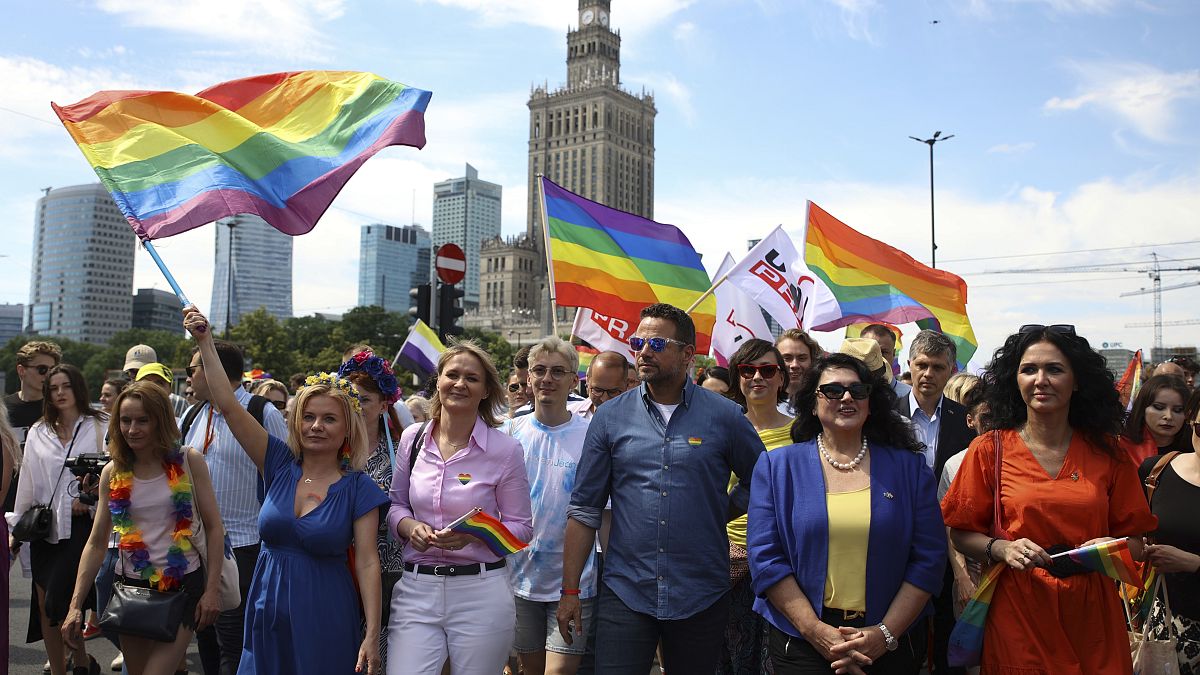 Warsaw mayor Rafal Trzaskowski and European Commissioner for Equality Hanna Dalli take part in the 'Warsaw and Kyiv Pride' marching for freedom in Warsaw, Poland, 25 June 2022