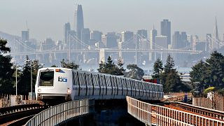 A BART train approaches MacArthur Station in Oakland, California, US.