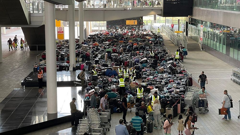 Heathrow passengers kick up a stink over mountains of smelly luggage
