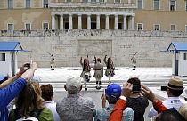 Turistas haciendo fotografías en Grecia