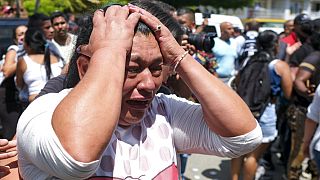 Una mujer llora ante la cárcel de Tuluá, Colombia