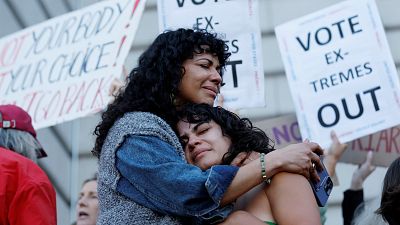 A woman hugs her daughter during an abortion-rights protest in San Francisco