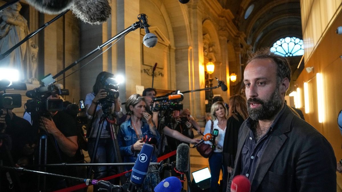 Arthur Dénouveaux, survivor of the Bataclan attack and president of life for Paris association, speaks to the media after the verdict in Paris Wednesday, June 29, 2022.