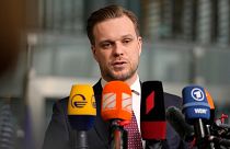 Lithuanian Foreign Minister Gabrielius Landsbergis speaks with the media as he arrives for a meeting of NATO foreign ministers at NATO headquarters in Brussels, April 2022.