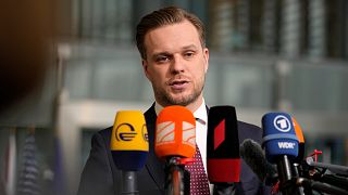 Lithuanian Foreign Minister Gabrielius Landsbergis speaks with the media as he arrives for a meeting of NATO foreign ministers at NATO headquarters in Brussels, April 2022.