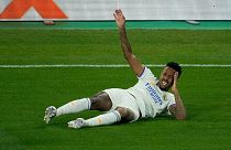 Real Madrid's Eder Militao suffers an injury during the Champions League Final