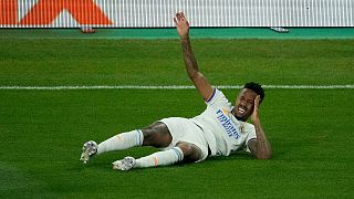 Real Madrid's Eder Militao suffers an injury during the Champions League Final