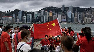 Прокитайский митинг в Гонконге, приуроченный к 25-летию со дня перехода города под юрисдикцию Китая, 1 июля 2022 г.