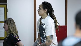 WNBA star Brittney Griner is escorted to the courtroom in Khimki just outside Moscow on 1 July 2022.