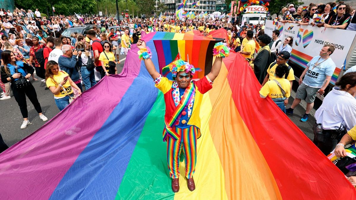 Mohammed Nazir poses during the Pride in London parade, in London, Saturday, July 2, 2022, marking the 50th Anniversary of the Pride movement