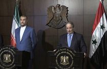 Syrian Foreign Minister Faisal Mekdad and his Iranian counterpart Hossein Amir-Abdollahian hold a press conference