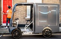 A new electric-cargo bike driven around London to mark the announcement of Amazon's first UK micromobility hub for more sustainable deliveries.