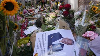 Tributes are placed at the spot where journalist Peter R. de Vries was shot in Amsterdam.