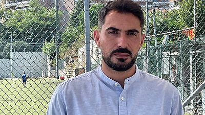Davide Capello, 37, former professional footballer and survived at the Morandi motorway bridge tragedy, poses at the Ruffinengo stadium in Savona, on July 1, 2022. 