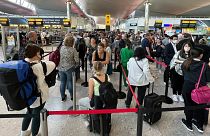 Travellers face long queues at London's Heathrow airport