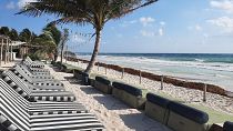 A resort in Tulum last week, with a barrier of sargassum appearing unusually early in March 2023.
