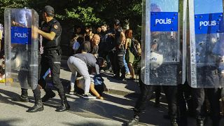 Some protesters were forced to the ground by police in Ankara.