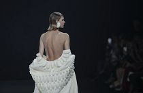 A model wears a creation as part of Stephane Rolland's Haute Couture Fall/Winter 2022-2023 fashion collection presented Tuesday, July 5, 2022 in Paris.