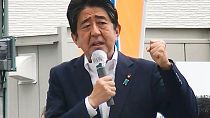 In this image from a video, Japan’s former Prime Minister Shinzo Abe makes a campaign speech in Nara, western Japan shortly before he was shot Friday, July 8, 2022.