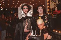 Kevan Klawitter, left, Richard Osborne, front, and Adam Nikell, right, dressed as characters from the cult classic film "The Rocky Horror Picture Show"