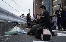 Grief in Japan after the assassination of Shinzo Abe, 8th Jul 2022.