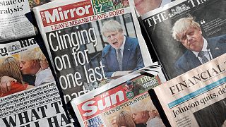 Front pages of British national newspapers, each leading with a front page story of the resignation of Boris Johnson as leader of Britain's Conservative Party, July 8, 2022.