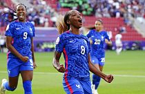France's Grace Geyoro celebrates after scoring the opening goal during the Women Euro 2022 group D soccer match between France and Italy