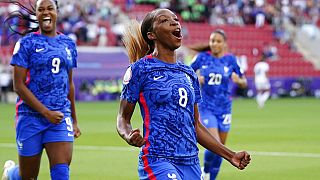France's Grace Geyoro celebrates after scoring the opening goal during the Women Euro 2022 group D soccer match between France and Italy