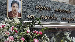 Flowers are placed on the tomb of Miguel Angel Blanco in Ermua in December 2005.