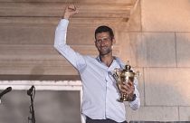 Serbia's Novak Djokovic celebrates his victory at the Wimbledon tennis tournament during a welcoming ceremony in Belgrade.