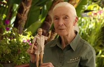 A handout picture shows primatologist Jane Goodall posing with the new Jane Goodall Barbie doll, in Los Angeles, U.S., April 2022. 
