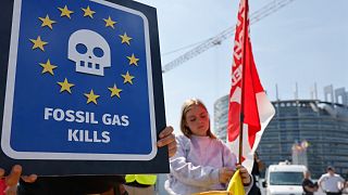 Climate activists demonstrate outside the European Parliament, July 6, 2022 in Strasbourg, eastern France. 