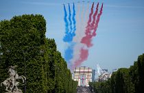 Празднование Дня взятия Бастилии в Париже.
