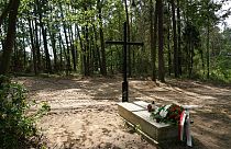 A symbolic cross has been placed at the site of the mass grave in the Bialucki Forest near Ilowo.