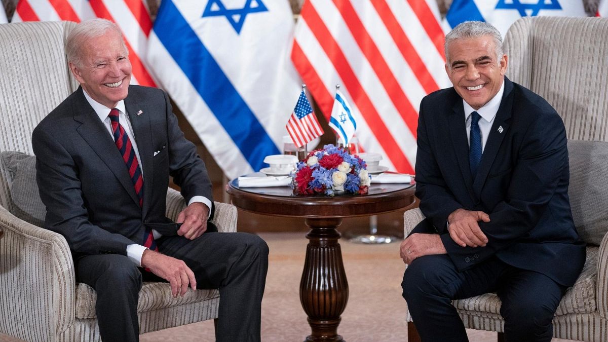 President Joe Biden, left, and Israeli Prime Minister Yair Lapid address the media following their meeting in Jerusalem Thursday, July 14, 2022.