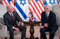 President Joe Biden, left, and Israeli Prime Minister Yair Lapid address the media following their meeting in Jerusalem Thursday, July 14, 2022.