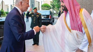 Saudi Crown Prince Mohammed bin Salman (R) greets President Joe Biden with a fist bump after his arrival in Jeddah, Saudi Arabia, July 15, 2022.