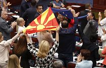 North Macedonia's ruling coalition celebrates the vote on 16 July 2022.
