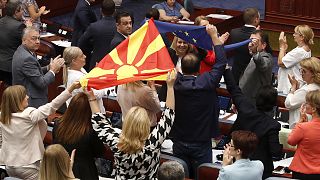 North Macedonia's ruling coalition celebrates the vote on 16 July 2022.