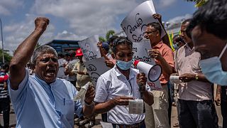 Des représentants syndicaux et des militants lors d'une manifestation contre le président par intérim du Sri Lanka, Ranil Wickremesinghe, à Colombo, lundi 18 juillet 2022.