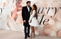FILE - Cast member Jennifer Lopez, right, and Ben Affleck attend a photo call for a special screening of "Marry Me" at DGA Theater on Feb. 8, 2022, in Los Angeles.