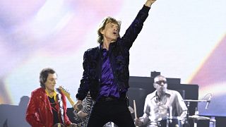 Ronnie Wood (L), Mick Jagger and US musician Steve Jordan performing at the Ernst-Happel Stadium in Vienna