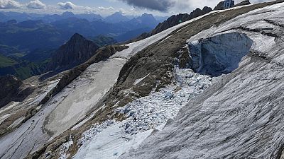 A view taken from a rescue helicopter of the Punta Rocca glacier near Canazei, in the Italian Alps in northern Italy, 