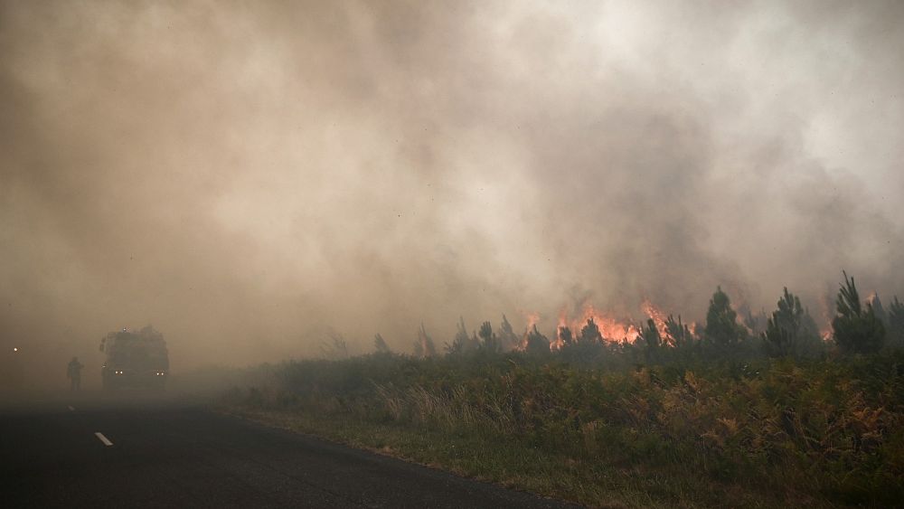 France’s evacuated residents help firefighters at crisis centre