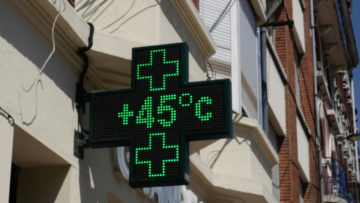 A pharmacy display the temperature, 45 degrees Celsius (113 Fahrenheit) in Lille, France, 19 July 2022.