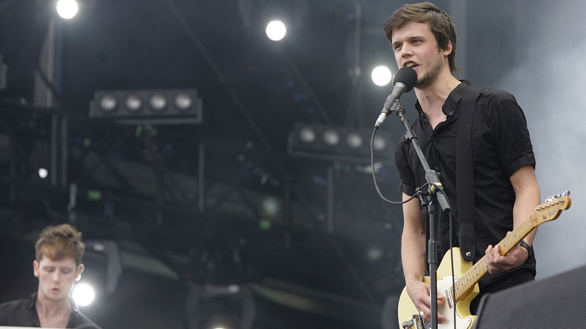 Harry McVeigh, right, and Tommy Bowen of the British band the White Lies at the Isle of Wight festival 2009