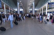 مسافرون في مطار كوبنهاغن في الدنمارك