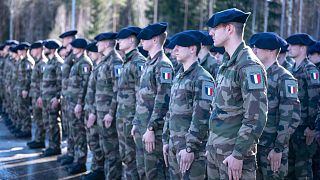 French troops from the 7th Mountain Battalion line up at Amari air base, Estonia, Thursday, March 17, 2022.